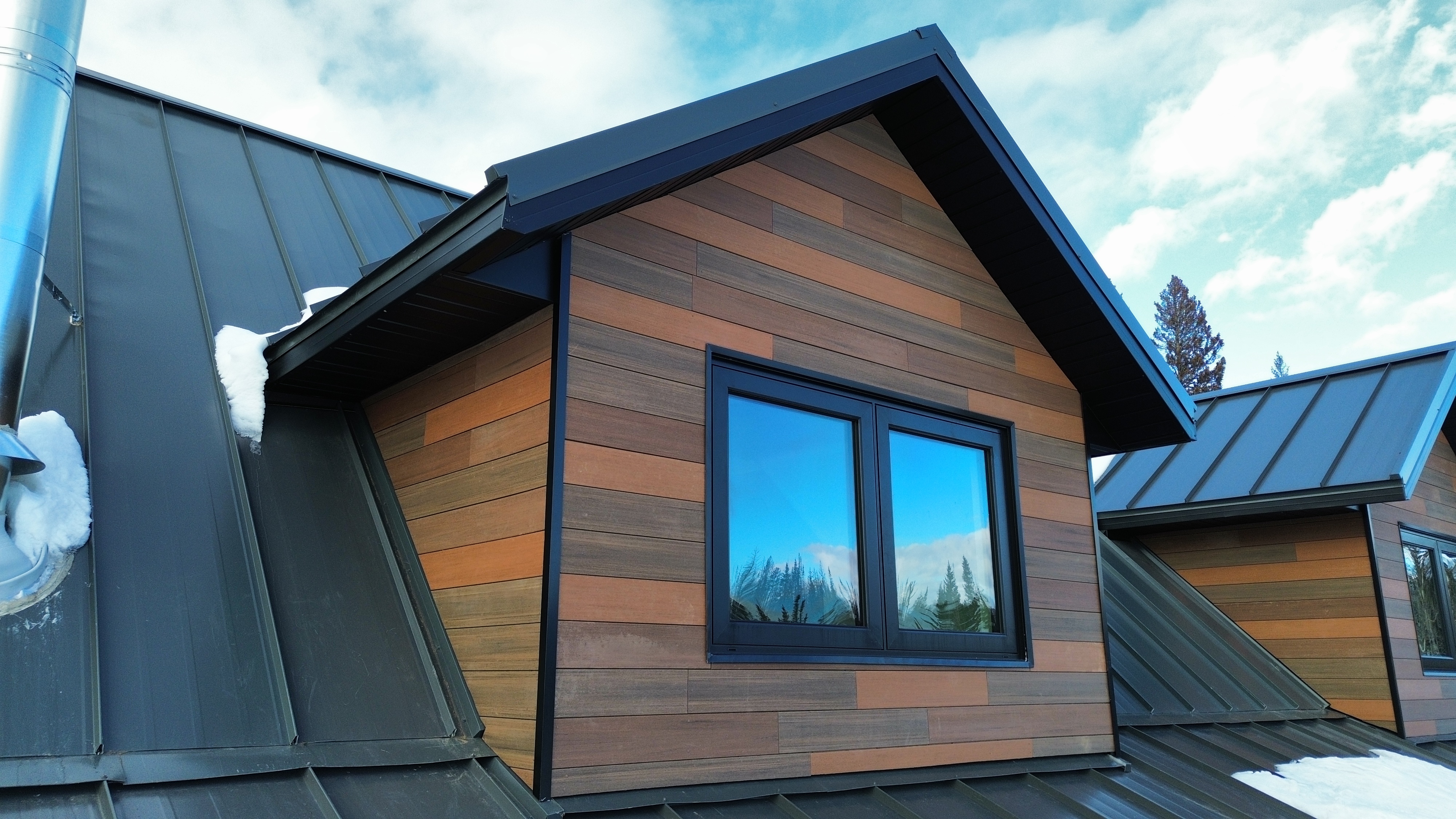 Cedar Lap Siding with Black Trim & Metal Roof
